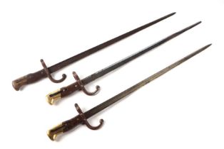 Three 19th century French Gras bayonets, each with 52cms steel blades (3).