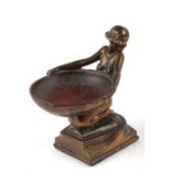 An Art Nouveau style gilt brass figural bonbon dish in the form of a nude female kneeling holding