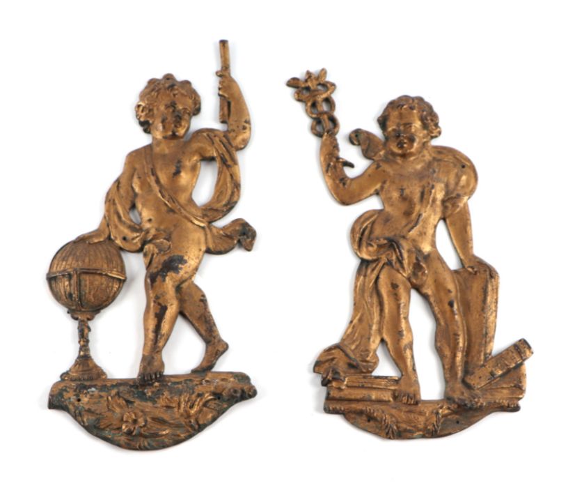 A pair of gilt bronze wall plaques depicting putti, 26cms high (2).