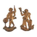 A pair of gilt bronze wall plaques depicting putti, 26cms high (2).