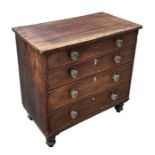 A 19th century mahogany and pine chest of four graduated long drawers, glass handles, on turned