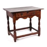 A 19th century oak side table with moulded rectangular top above a single frieze drawer, on turned