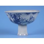 A Chinese blue & white stem cup decorated with young boys in a landscape, six character mark to