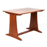 A mid century Modernist teak occasional table, the rectangular top on trestle supports joined by a