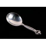 A Georg Jensen silver acorn design caddy spoon, 25g, 10cms long.