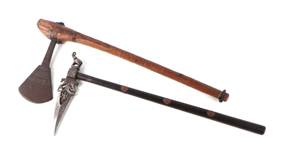 An African tribal axe with carved wood shaft, 59cms long; together with an Indian zhaghnal (2).