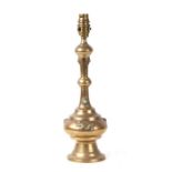 An Indian cast brass table lamp decorated with birds, animals and cabochons, 30cms high.