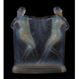 A Rene Lalique style early 20th century opalescent glass figural group depicting two female nudes