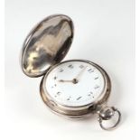 An early 19th century George III silver hunter pocket watch, the white porcelain dial with Arabic