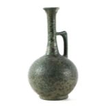 A continental Studio pottery ewer influenced by Dr Christopher Dresser, with verdigris style