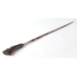 A short sword stick with carved horn handle in the form of a horses hoof, overall length 45cms,