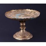 A 19th century gilt copper tazza with Sotheby's label to the underside, 28.5cms diameter.