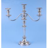 A silver plated candelabra in the Adam taste, 44cms high.