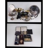 A set of six silver teaspoons, Birmingham 1947, 127g, cased; together with a set of silver plated