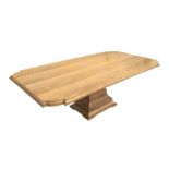 A Bayley modern design oak rectangular dining table on single column, 235 by 121cms.
