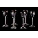 A set of six late 18th century style opaque air twist cordial glasses with gilded rim, funnel