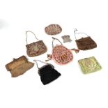 A small collection of Victorian ladies purses to include embroidered and mesh examples.