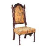 A 19th century occasional chair with upholstered seat and back with barleytwist supports and front