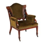 A late Victorian / Edwardian rosewood upholstered nursing chair with inlaid decoration.