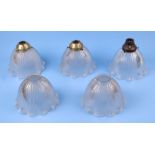 Nine Holophane moulded glass ceiling lights with frilled edge, each 17.5cms diameter (9).