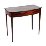 A 19th century mahogany bowfront side table in the Hepplewhite taste, the single frieze drawer