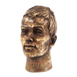 A carved wooden and gesso study of a man's head, 27cms high. Condition ReportHead looks to be a