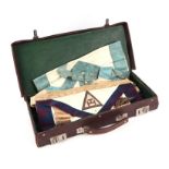 A leather case containing masonic regalia