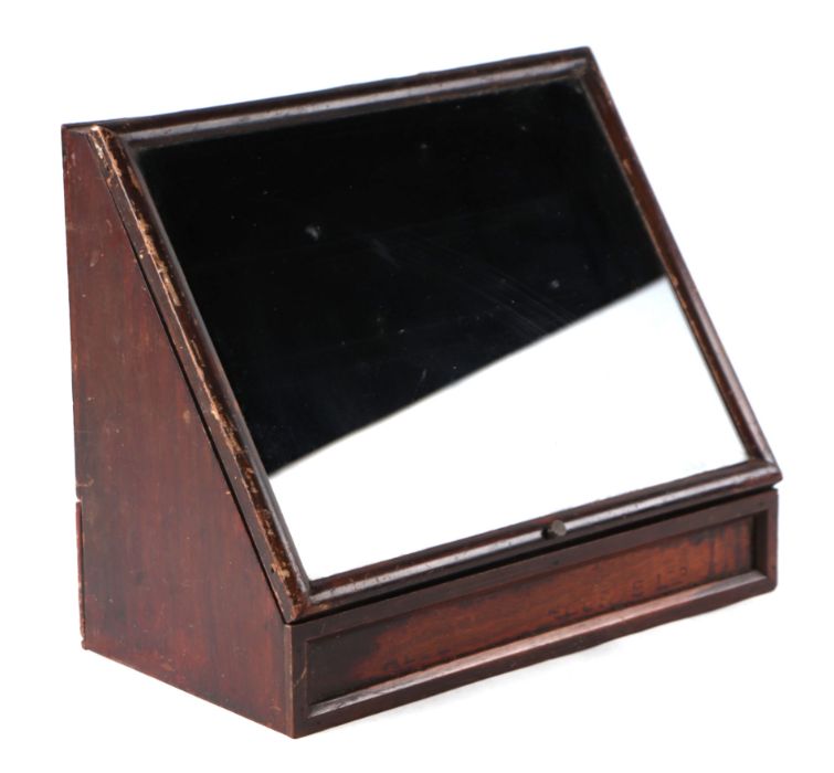 A tabletop display cabinet with sloping front, 34cms wide.