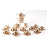 A Japanese Kutani coffee set decorated with butterflies and gilt highlights.Condition ReportOne of