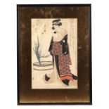 A Japanese woodblock print depicting a robed woman reading a scroll standing next to a plant, signed