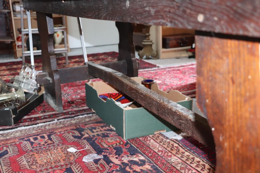 A large 17th century style oak refectory table with four plank top, on trestle supports joined by - Image 18 of 20