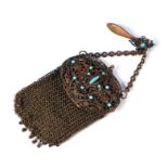 A 19th century white metal chain link purse inset with turquoise coloured cabochons.Condition