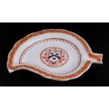 A Chinese armorial leaf shaped dish with the arms for William Walker of Hertfordshire, 21cms wide.