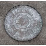 A large Persian / Islamic copper circular tray with traditional decoration, 92cms diameter.
