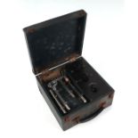 A vintage Electric Medical Shock machine, cased; together with an Ensign Pocket Twenty bellows