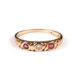 A 9ct gold diamond and ruby half hoop ring, the central diamond flaked by two rubies, approx UK size