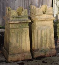 A pair of pottery chimneypot planters, 72cms high (2).