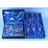 A boxed set of six Doulton International Crystal wine flutes; together with a boxed set of Thomas