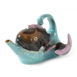 A late Victorian Brownfield majolica teapot and cover in the form of a fish jumping out of the