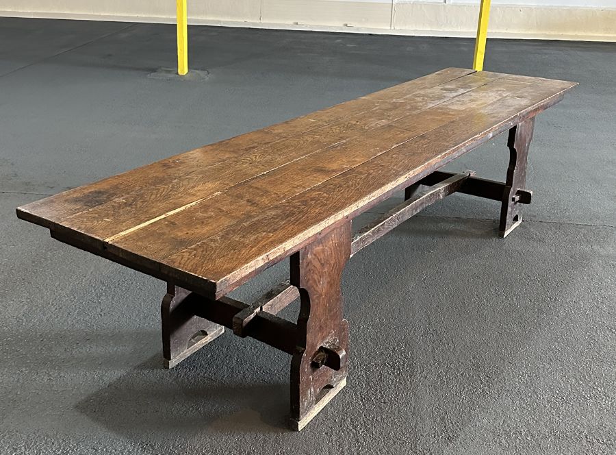 A large 17th century style oak refectory table with four plank top, on trestle supports joined by - Image 2 of 20