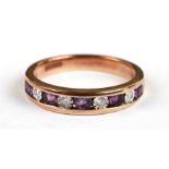 A 9ct gold amethyst and diamond half hoop eternity ring, approx UK size 'L', 2.5g.Condition