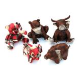 A group of modern doorstops to include a leather pig, cow and frog and a tartan teddy bear and