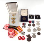 A group of WWII medals; together with a pair of George V Coronation medals and its matching