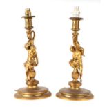 A pair of gilt bronze figural table lamps, the columns in the form of neo-classical figures, each