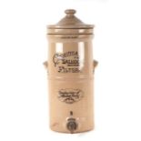 A Cheavins Saludor stoneware water filter, 51cms high.(a/f)