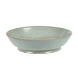 A Chinese crackle ware celadon glaze brush washer, 14cms diameter.