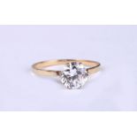 A 14ct gold and zirconia solitaire ring, approx UK size 'M', 1.7g.