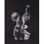 A French Daum glass figure in the form of a seated elephant, signed to the back, 24cms high.