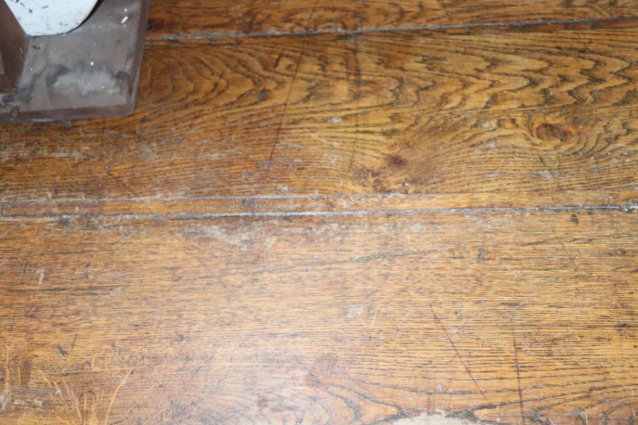 A large 17th century style oak refectory table with four plank top, on trestle supports joined by - Image 20 of 20