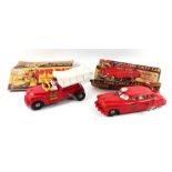 A Marx of America clockwork Fire Chief car with plastic body, siren and automatic flashing lights,